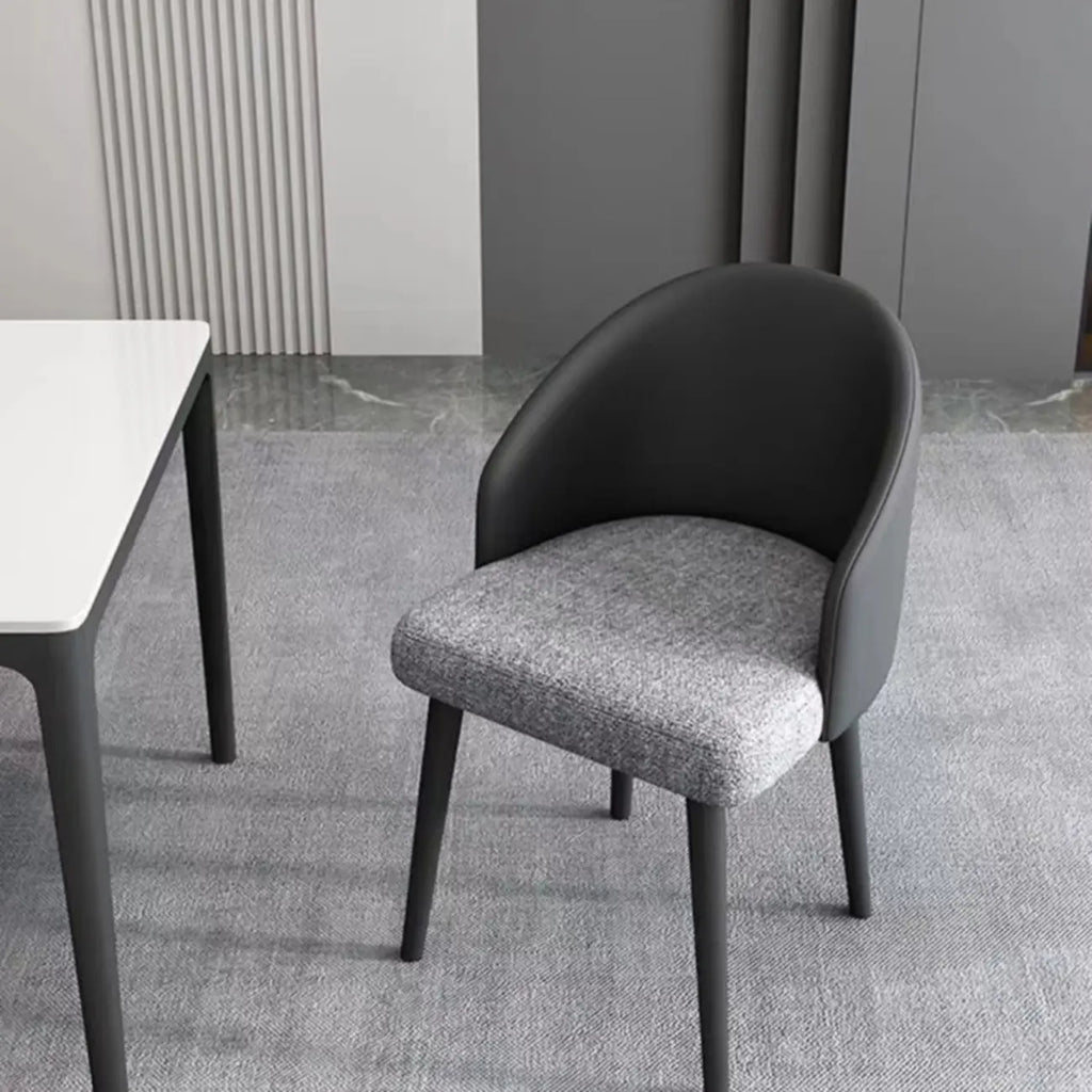 Chaise de salle à manger minimaliste noire rembourrée en tissu, dossier bas