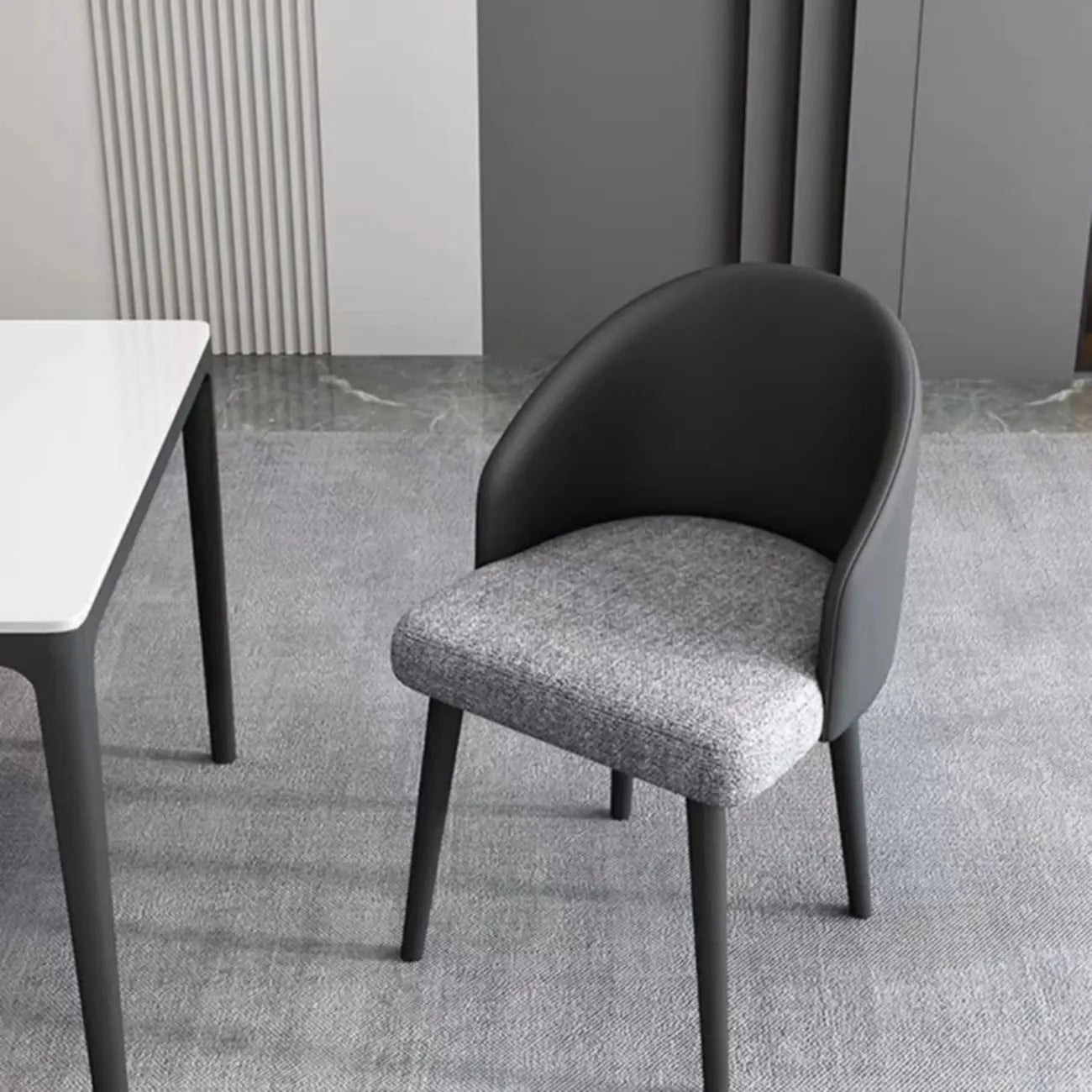 Chaise de salle à manger minimaliste noire rembourrée en tissu, dossier bas