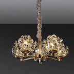 Lustre en verre cristal doré à motif floral, design moderne.