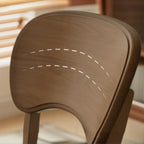Chaise de salle à manger rembourrée de style vintage en bois noir avec assise confortable