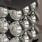 Table d'appoint moderne et artistique sur piédestal en métal avec plateau en pierre