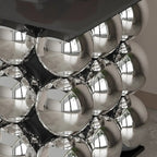 Table d'appoint moderne et artistique sur piédestal en métal avec plateau en pierre