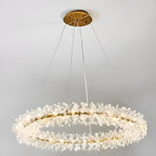 Lustre circulaire en cristal doré, design moderne.
