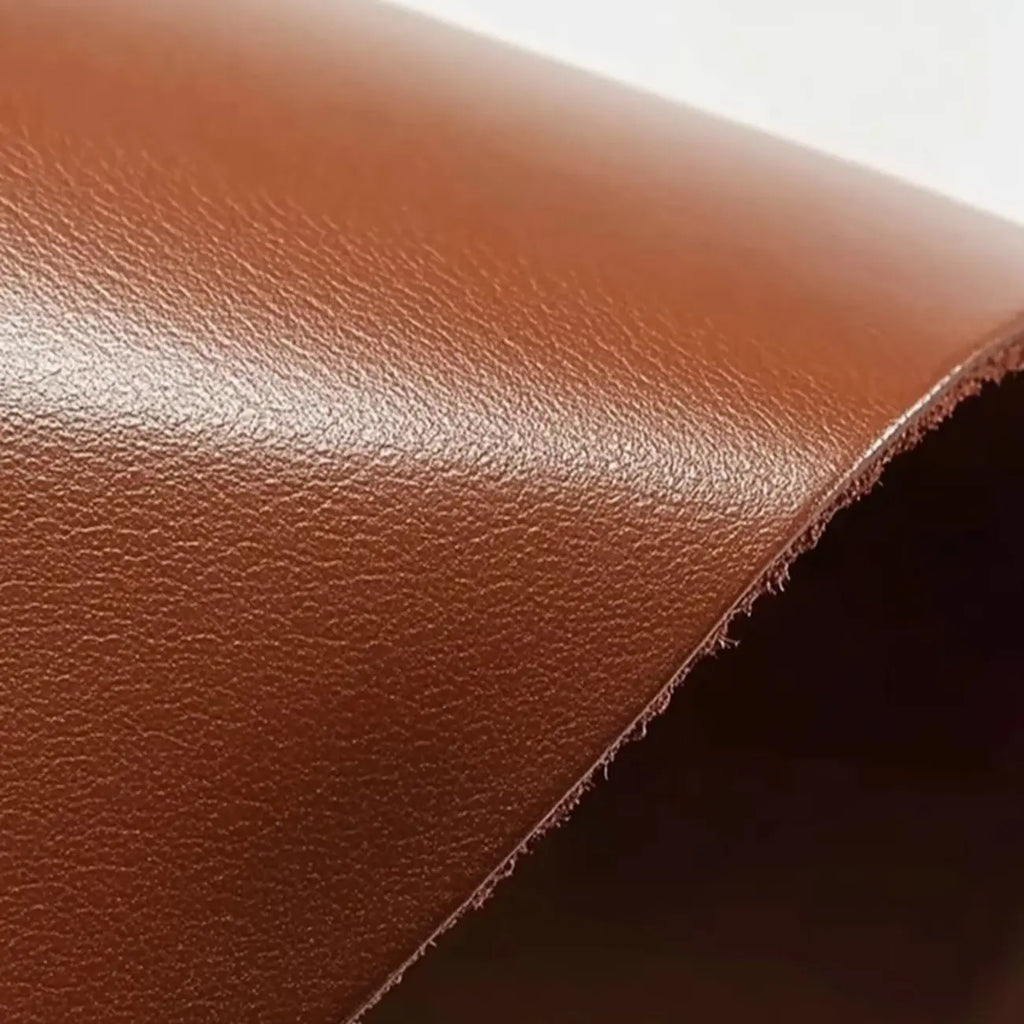 Fauteuil de salon rembourré en cuir véritable marron