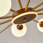 Lustre moderne en verre doré à structure linéaire sphérique