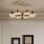 Lustre moderne en cristal noir et cristal, branche en bois.