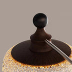 Lustre moderne en cristal noir et cristal, branche en bois.