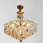 Lustre en cristal doré orné de perles et au design moderne et élégant