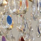 Lustre en cristal doré orné de perles et au design moderne et élégant
