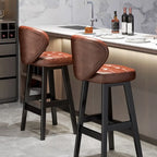 Tabourets de bar décontractés en cuir brut couleur cognac, avec dossier quadrilatéral, assise et repose-jambes.