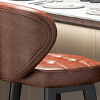 Tabourets de bar décontractés en cuir brut couleur cognac, avec dossier quadrilatéral, assise et repose-jambes.
