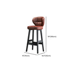 Tabourets de bar décontractés en cuir brut couleur cognac, avec dossier quadrilatéral, assise et repose-jambes.