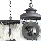 Suspensions extérieures industrielles en verre gris bronze à 3 lumières