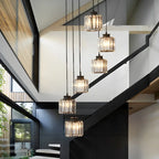Suspension cylindrique en cristal à spirale pour cage d'escalier contemporaine