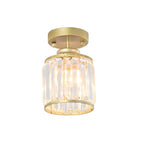 Plafonnier semi-encastré élégant en cristal clair, de forme cylindrique.