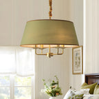Lustre moderne chic en métal doré, structure tambour.