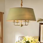 Lustre moderne chic en métal doré, structure tambour.