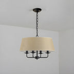 Lustre moderne chic en métal doré, structure tambour.
