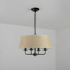 Lustre moderne chic en métal doré, structure tambour.