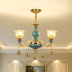 Magnifique lustre à suspension florale en verre bleu et or avec pendentifs