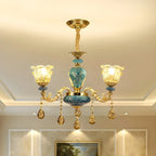 Magnifique lustre à suspension florale en verre bleu et or avec pendentifs