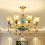 Magnifique lustre à suspension florale en verre bleu et or avec pendentifs