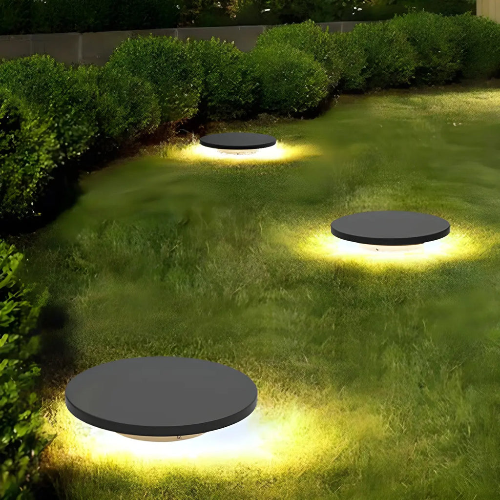 Disque métallique gris mat pour éclairage solaire paysager