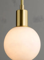 Suspension minimaliste en albâtre blanc, forme globe.