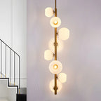 Lampadario verticale a 8 luci moderno in ottone con aste a discesa multidirezionali