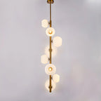 Lampadario verticale a 8 luci moderno in ottone con aste a discesa multidirezionali