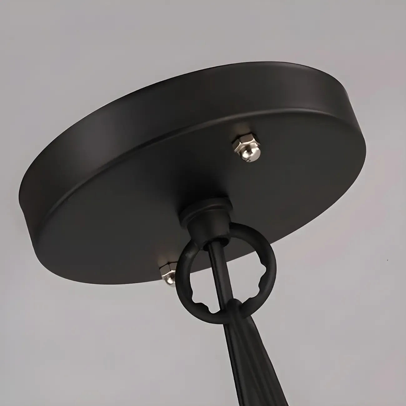 Lustre industriel en métal noir avec globe et cage, type candélabre