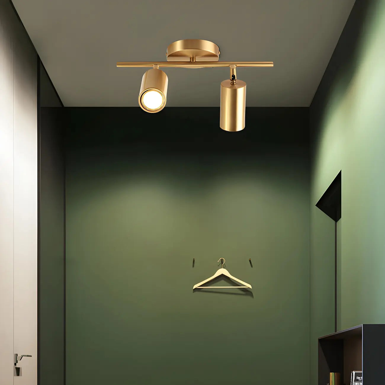 Faretto su binario a 4 luci color oro chiaro con teste regolabili