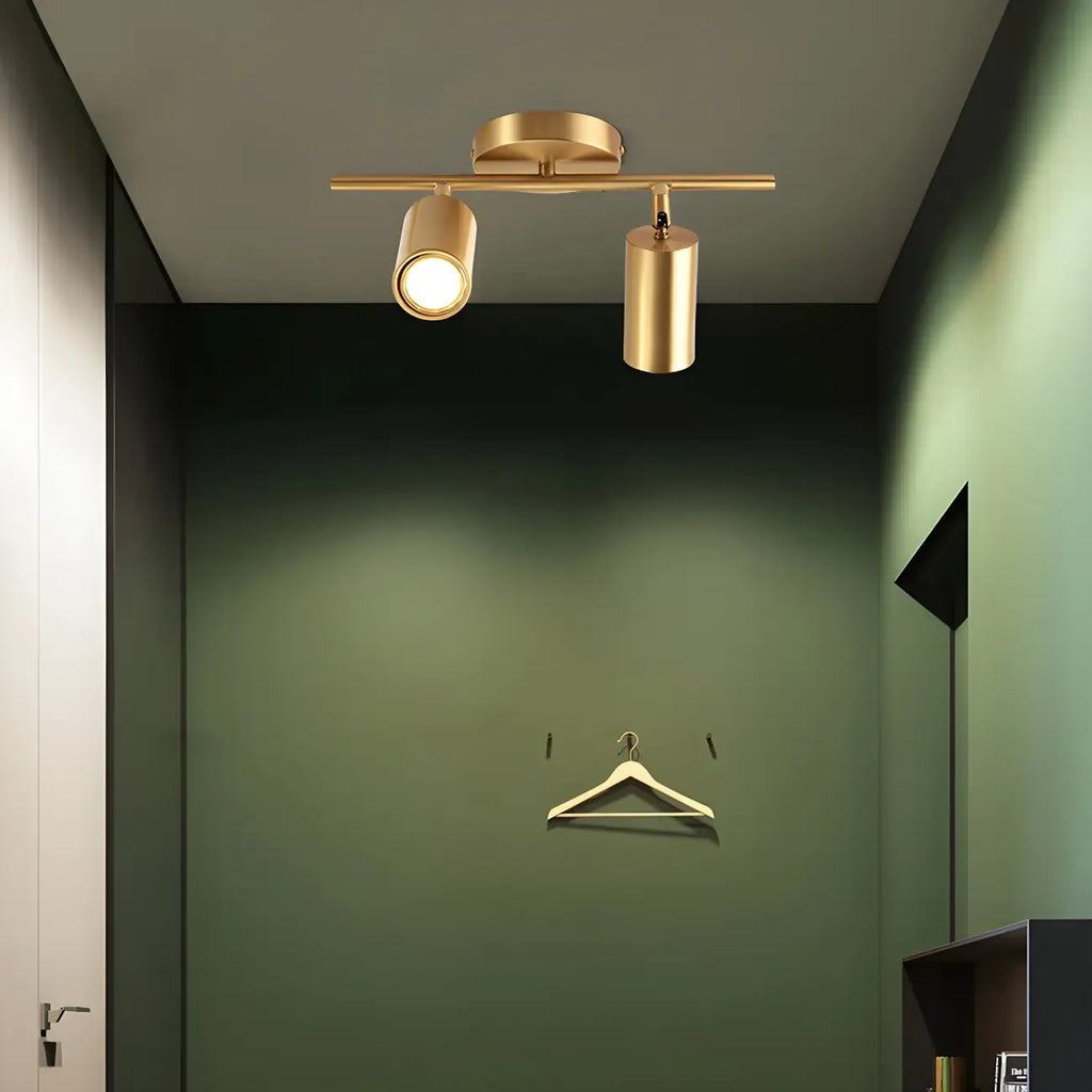 Faretto su binario a 4 luci color oro chiaro con teste regolabili