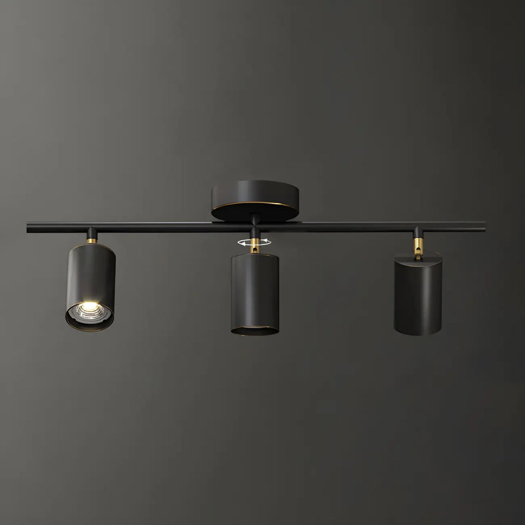 Faretto su binario a 4 luci color oro chiaro con teste regolabili
