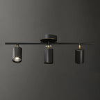 Faretto su binario a 4 luci color oro chiaro con teste regolabili