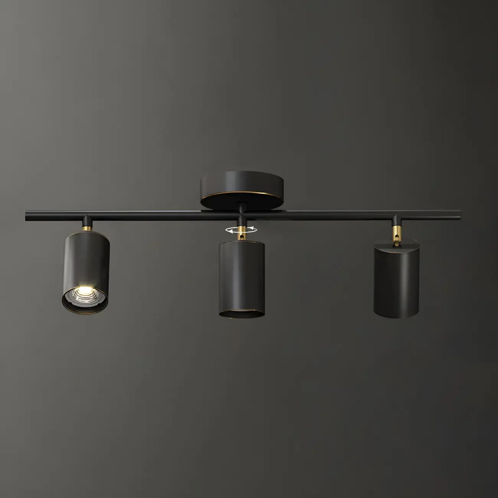 Faretto su binario a 4 luci color oro chiaro con teste regolabili