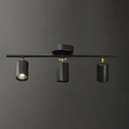 Faretto su binario a 4 luci color oro chiaro con teste regolabili