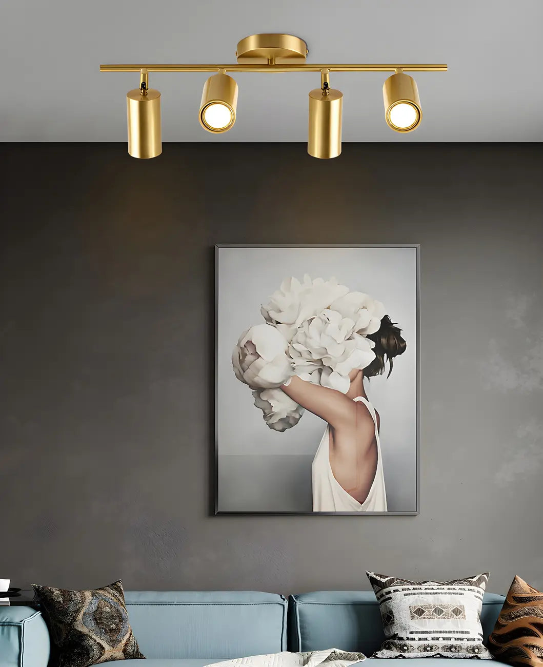 Faretto su binario a 4 luci color oro chiaro con teste regolabili