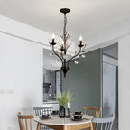 Lampadario a candelabro moderno ed elegante con rami neri e cristalli