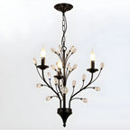 Lampadario a candelabro moderno ed elegante con rami neri e cristalli