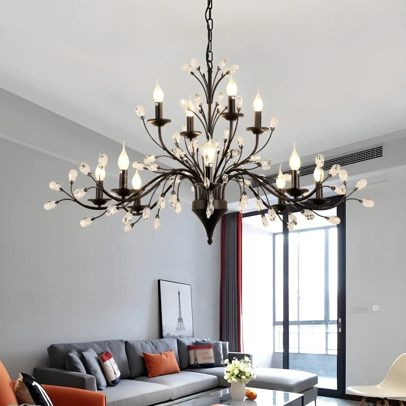 Lampadario a candelabro moderno ed elegante con rami neri e cristalli