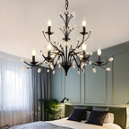 Lampadario a candelabro moderno ed elegante con rami neri e cristalli