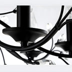 Lampadario a candelabro moderno ed elegante con rami neri e cristalli