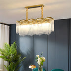 Lustre à chaîne en cristal cannelé doré pour salle à manger