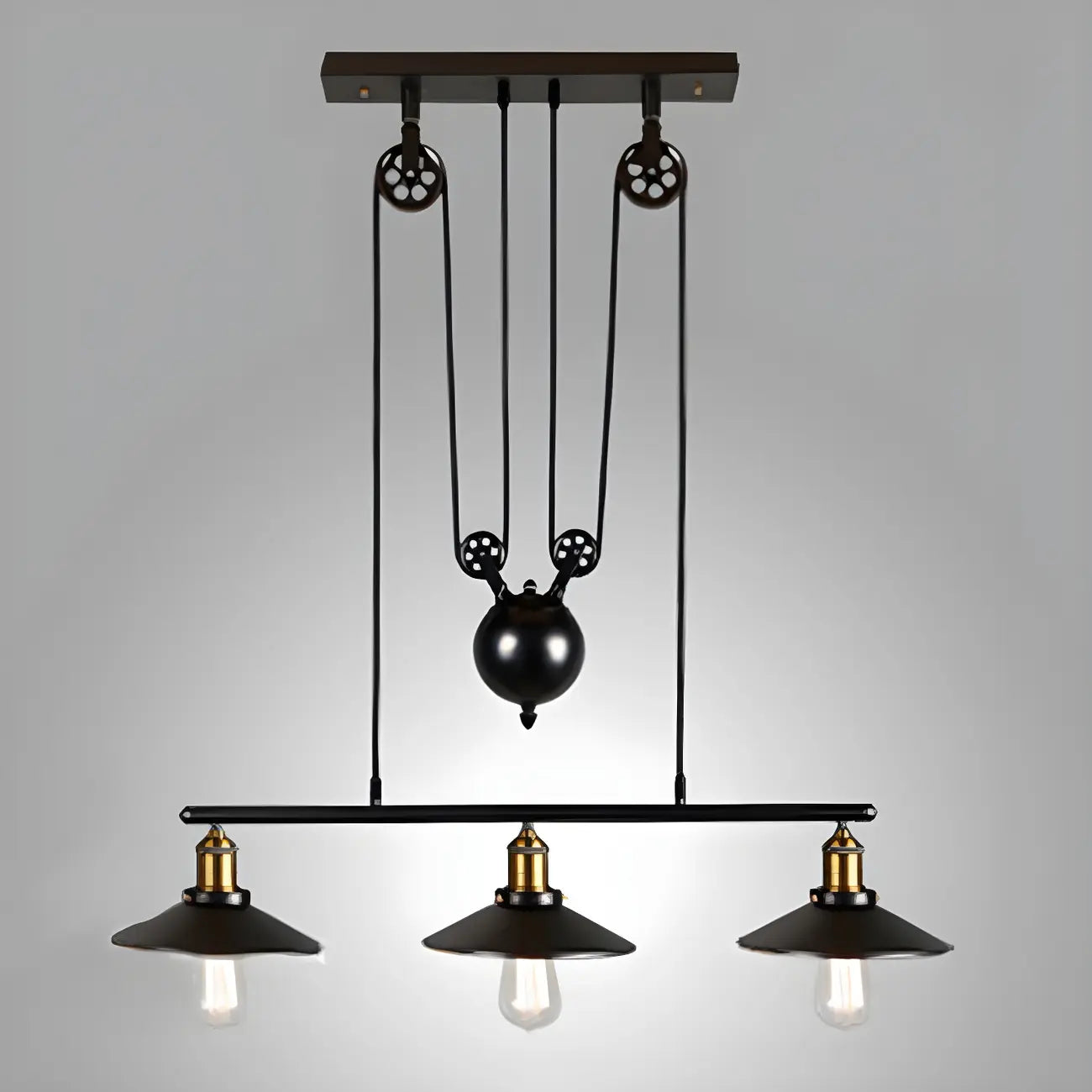 Suspension industrielle en métal noir avec poulie pour cuisine