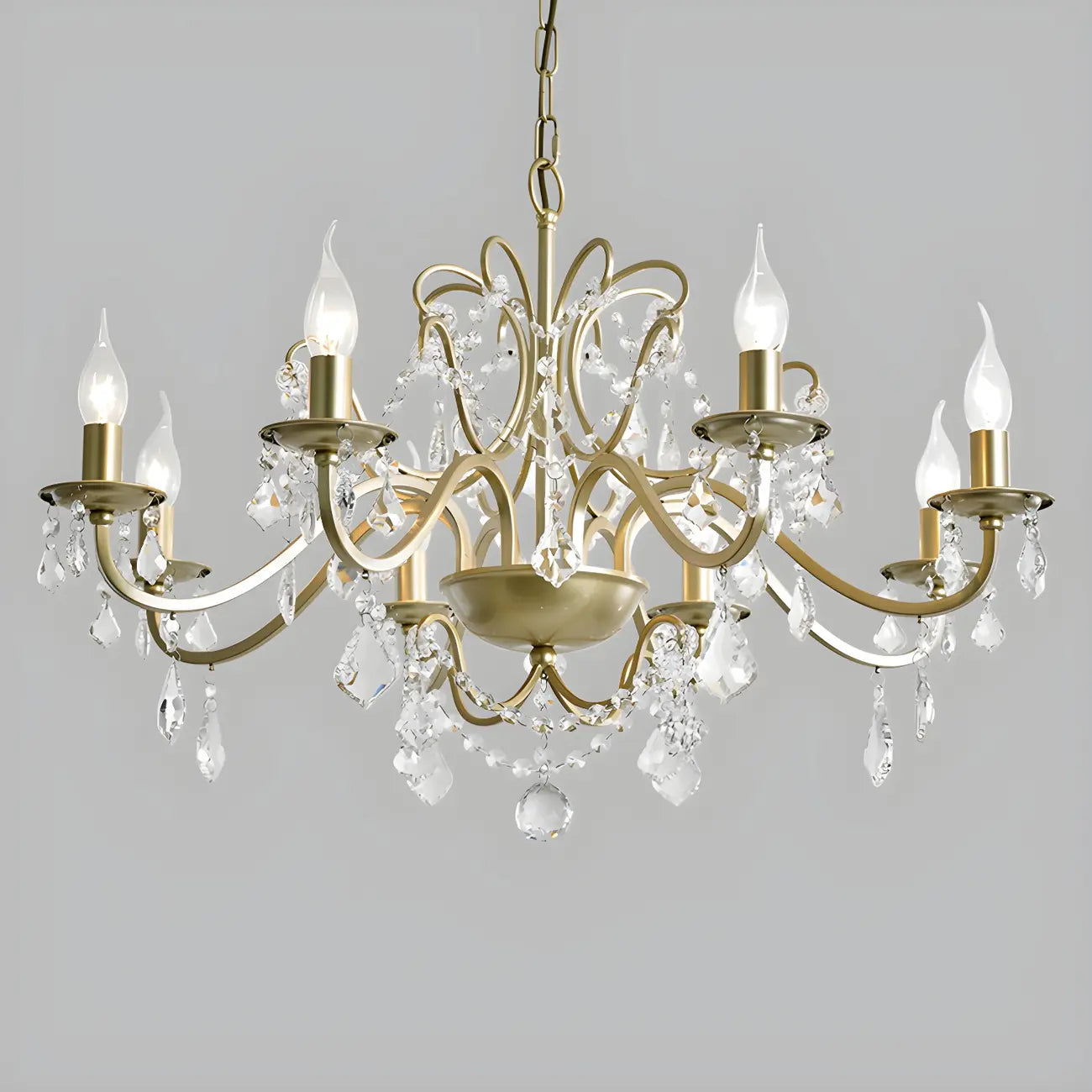 Lustre élégant en métal courbé et cristal doré