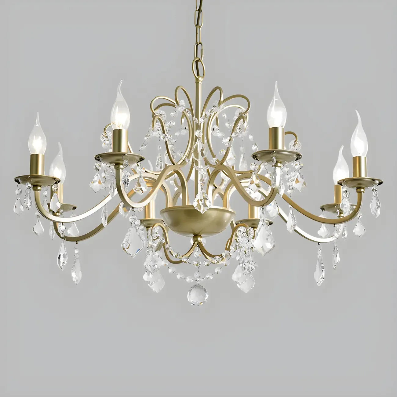 Lustre élégant en métal courbé et cristal doré