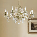 Lustre élégant en métal courbé et cristal doré