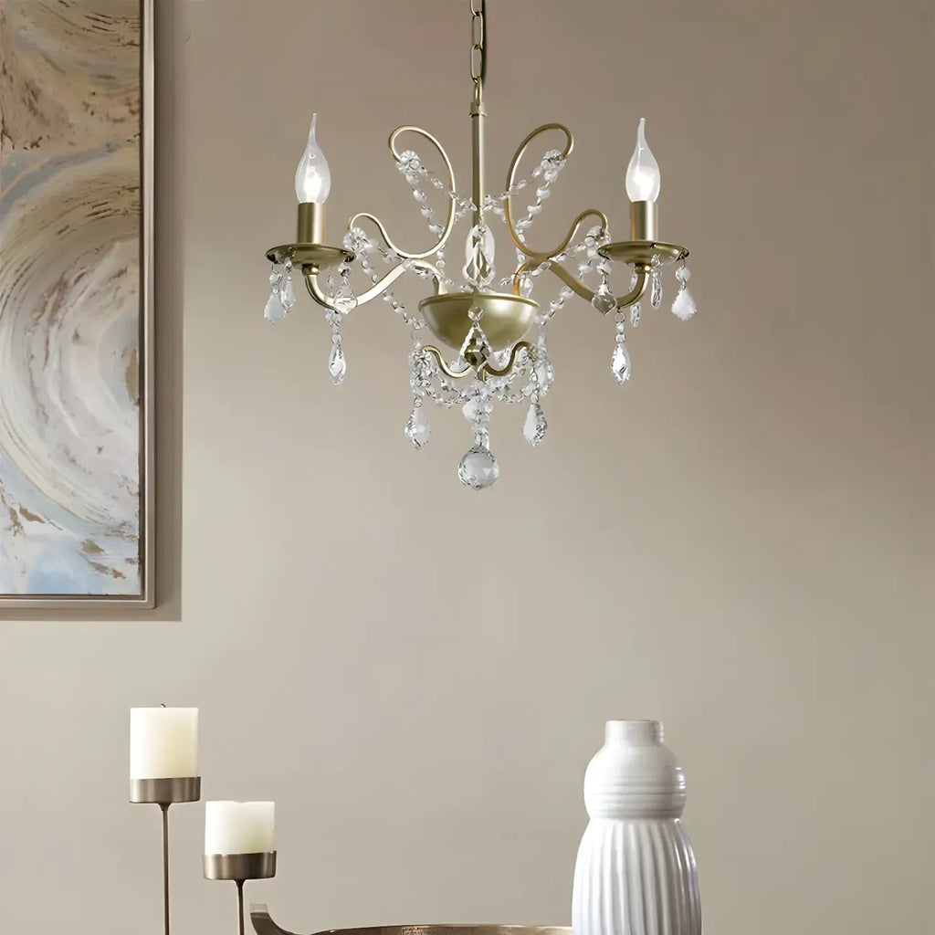 Lustre élégant en métal courbé et cristal doré