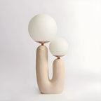Lampe de table en verre globe cactus en résine rose